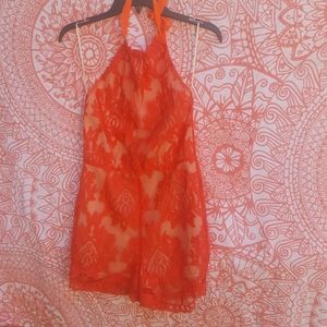 Orange foral romper by aqua